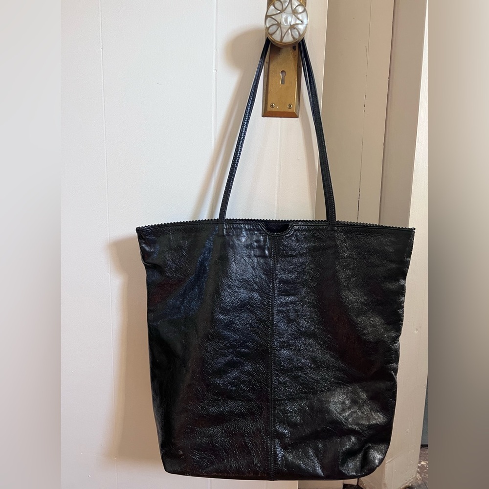 Latico Large leather tote with floral lining.